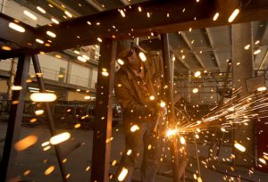 wELDER WORKING WITH SPARKS FLYING