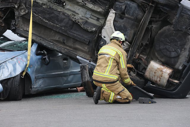 Firefighter responding to a tractor-trailer accident